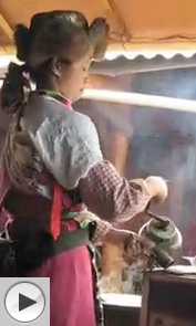 baba being cooked on Yulong Snow Mountain